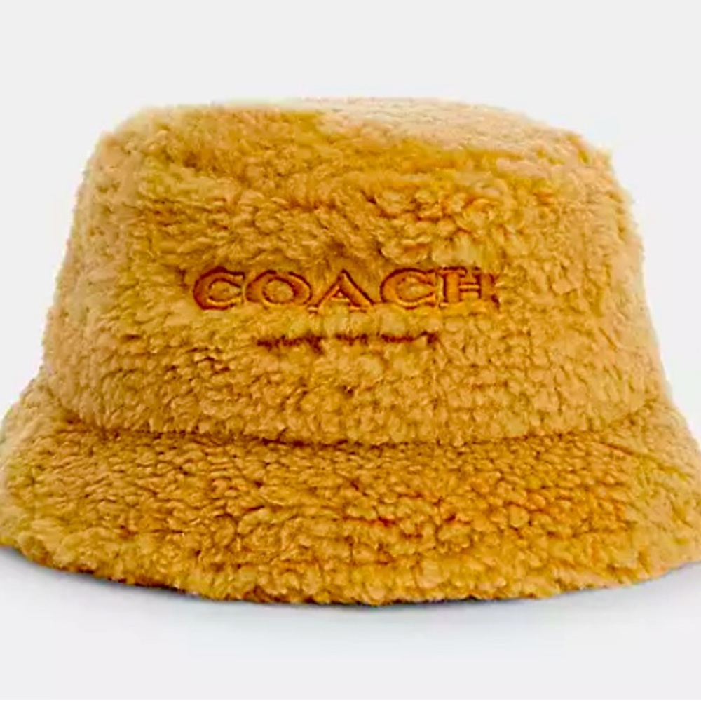 Searching for this Coach sherpa bucket hat in caramel.
